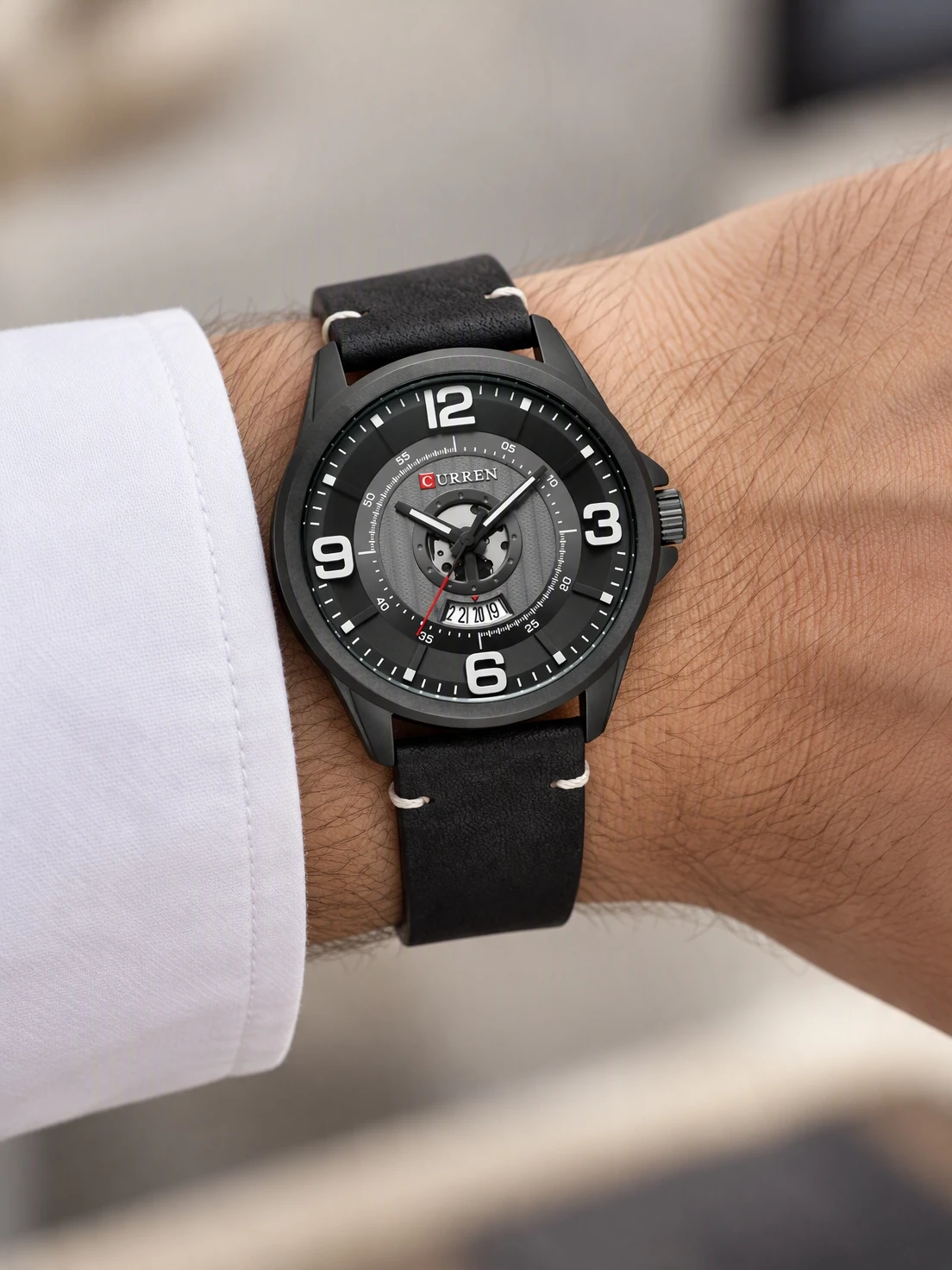 Gunmetal Arabic Date Leather worn on the wrist